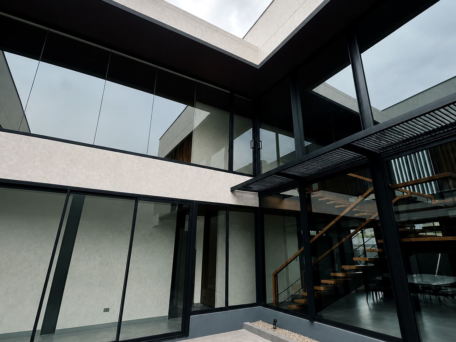 Clean courtyard glass facade and aluminum installation