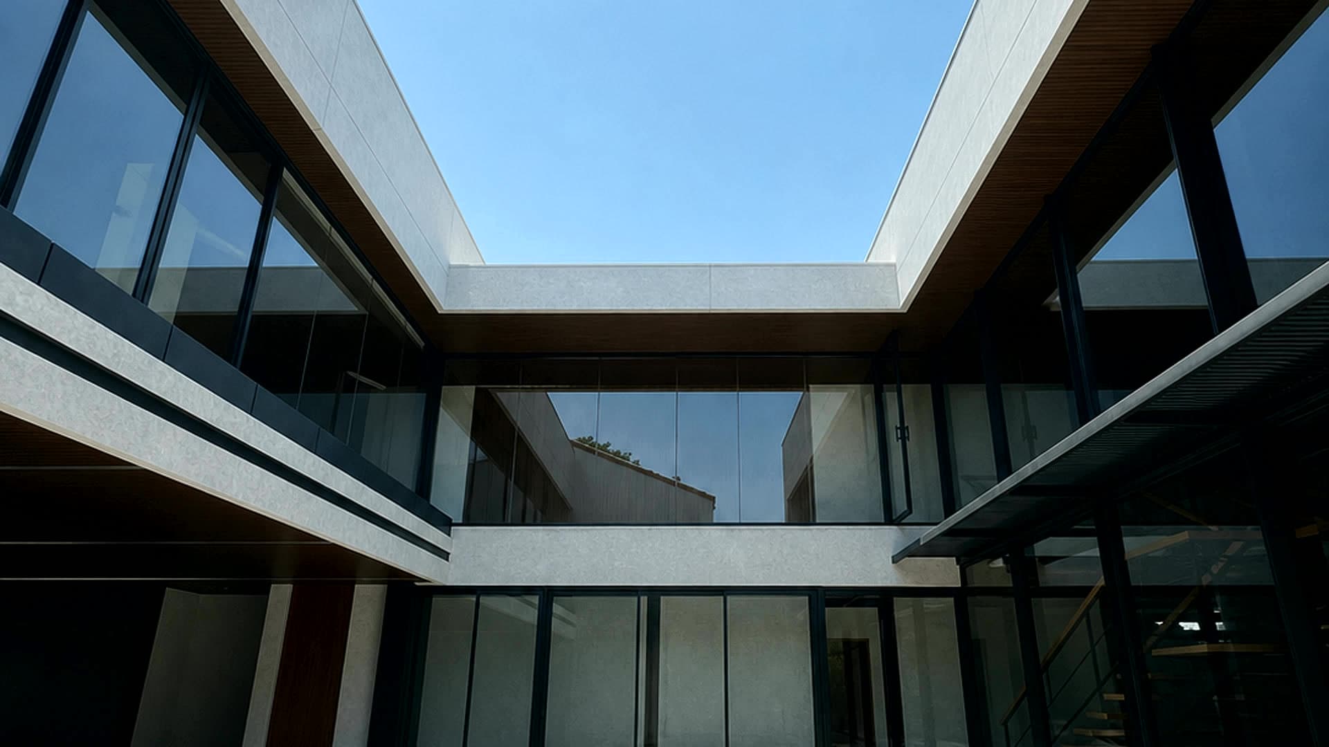 Clean glass and aluminum courtyard installation
