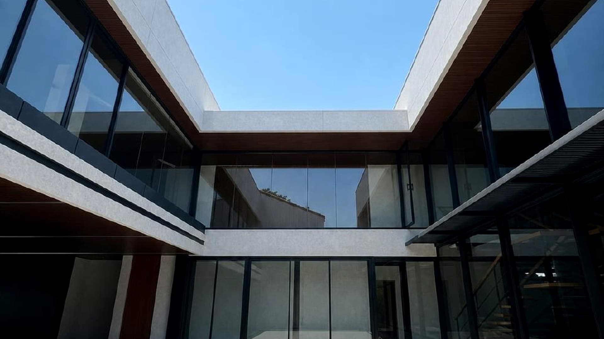 Modern glass and aluminum courtyard project
