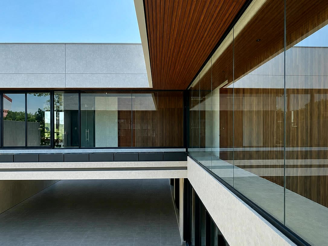 Clean glass facade installation with black aluminum frames